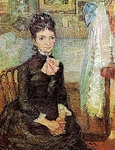 Женщина , сидящая рядом с колыбелью