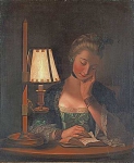 Женщина читающая у бумажного абажура