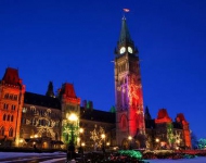 EN CA Christmas Lights on the Parliament Buildings Peace Tower Parliament Hill Ottawa