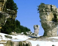 EN CA The famous flowerpots eroded limestone formations located on the shoreline of Flowerpot Island Georgian Bay in Fathom Five National Marine Park Ontario