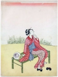 Молодая женщина сидит на бамбуковой скамейке у реки
