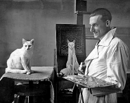 Французский художник Жак Леманн рисует портрет своего кота, 1924 год.