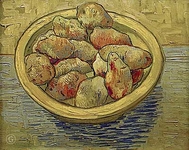 Натюрморт с картофелем на желтом блюде