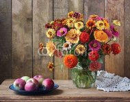 Still life with a bouquet and apples.