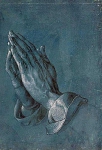 Руки в молитве